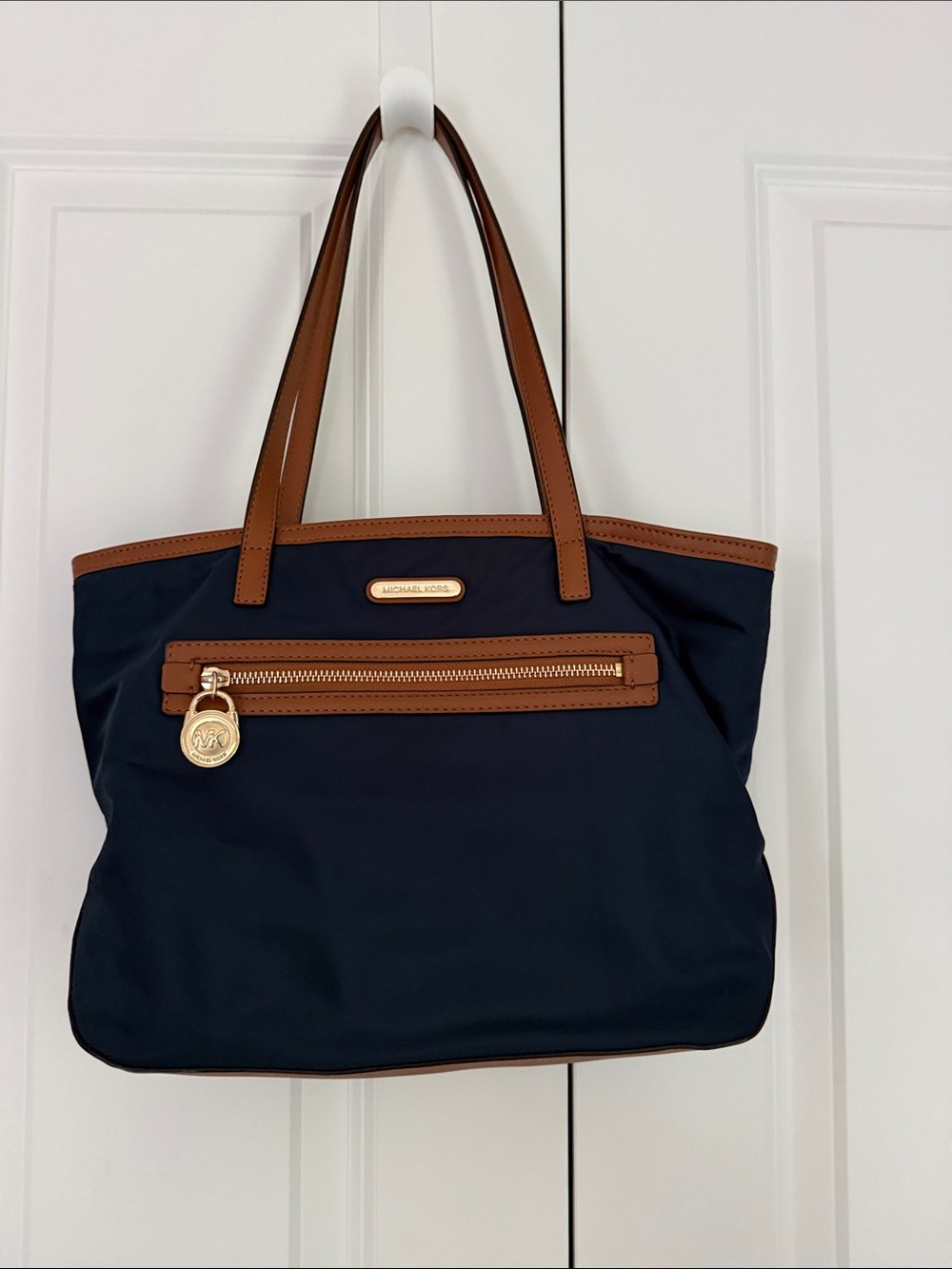 Michael Kors Navy Tote with Brown Trim and Gold Accents